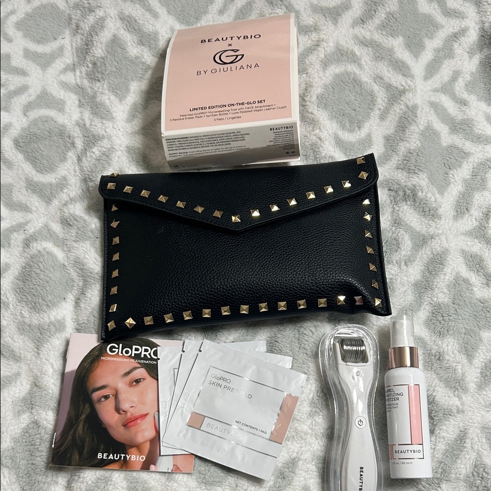 Black Studded Clutch with BeautyBio Skincare Set
